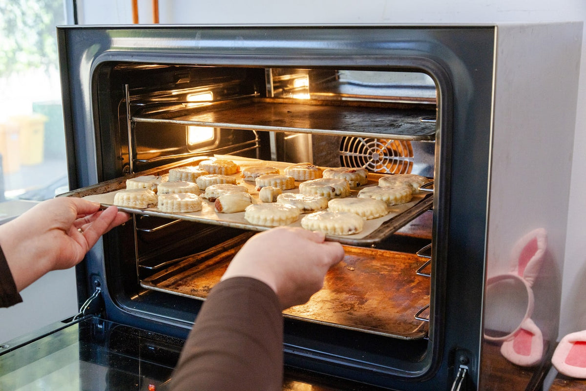 The scones go into the oven!