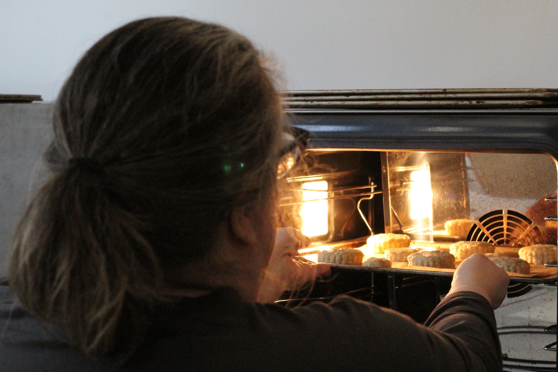 Course Leader Joanna checks on the progress of the scones in the oven...