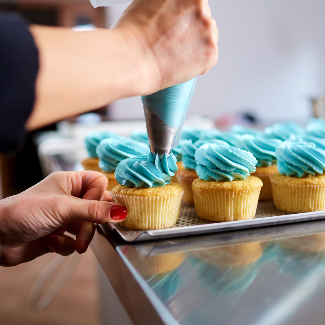 Decorate your own cupcakes like these blue iced vanilla flavoured cupcakes and enjoy a cupcake decorating party with Cook and Craft Collective.